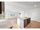 Bright kitchen featuring a central island, stainless steel appliances, and open layout at 261 Celestial Blvd, Summerville, SC 29486