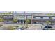 Retail front with a grocery store set in a landscaped parking lot with palm trees at 261 Celestial Blvd, Summerville, SC 29486