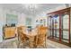Cozy dining room featuring a wooden table, chairs, and a beautiful hutch, perfect for Gathering gatherings at 276 S Railroad Ave, Harleyville, SC 29448