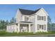 Charming two-story home featuring gray siding, dark shutters, and a welcoming front porch at 2964 Lodge Berry Ln, Johns Island, SC 29455