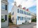 Charming two-story home featuring blue shutters and classic architectural details at 3 Atlantic St, Charleston, SC 29401