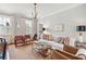 Open living room with hardwood floors, stylish seating, and ample natural light at 3 Atlantic St, Charleston, SC 29401