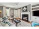 Elegant living room featuring neutral tones, fireplace, hardwood floors, and bright lighting at 3 Atlantic St, Charleston, SC 29401