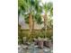 Serene outdoor area offers stone patio, mature plants, and a relaxing gathering space at 3 Atlantic St, Charleston, SC 29401