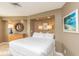 Serene main bedroom with a comfortable bed and stylish decor and recessed lighting at 302 Palmetto Dr # A-302, Isle of Palms, SC 29451
