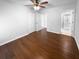 Spacious bedroom featuring wood floors, a closet, and an attached bathroom at 3048 Queensgate Way, Mount Pleasant, SC 29466