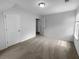 Neutral-toned bedroom with plush carpeting and a window to the side offers a peaceful and inviting atmosphere at 3048 Queensgate Way, Mount Pleasant, SC 29466
