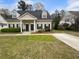 Charming townhome featuring a well-maintained lawn and a classic design at 3048 Queensgate Way, Mount Pleasant, SC 29466