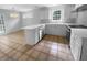 Modern kitchen featuring stone countertops, white cabinets, and stainless appliances at 3048 Queensgate Way, Mount Pleasant, SC 29466