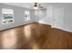Living room featuring beautiful wood floors, natural light and a ceiling fan at 3048 Queensgate Way, Mount Pleasant, SC 29466