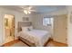 Bright bedroom featuring a comfy bed, a ceiling fan, and ample natural light at 338 King St # B, Charleston, SC 29401