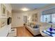 Comfortable living space with stylish furnishings, art, and a cozy atmosphere at 338 King St # B, Charleston, SC 29401