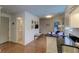 Open-concept living area featuring a kitchen, bathroom, and cozy bedroom at 338 King St # B, Charleston, SC 29401