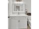 Bright bathroom featuring a white vanity with marble countertop and stylish gold-tone fixtures at 3409 Southern Cottage Way, Mount Pleasant, SC 29466