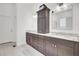 Bathroom with double vanity, marble countertops, and lots of cabinet storage at 3409 Southern Cottage Way, Mount Pleasant, SC 29466