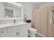 Bright bathroom featuring a white vanity with marble countertop and stylish gold-tone fixtures at 3409 Southern Cottage Way, Mount Pleasant, SC 29466