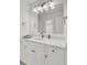 Bathroom featuring a white vanity with stone countertop and modern fixtures at 3409 Southern Cottage Way, Mount Pleasant, SC 29466
