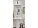 Bathroom features a pedestal sink, framed mirror, and neutral decor at 3409 Southern Cottage Way, Mount Pleasant, SC 29466