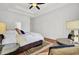 Inviting bedroom with hardwood floors, elegant furnishings, and ample space at 3409 Southern Cottage Way, Mount Pleasant, SC 29466