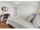 Bedroom with a comfortable bed, hardwood floors, and a makeup vanity at 3409 Southern Cottage Way, Mount Pleasant, SC 29466