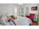 Cozy bedroom with hardwood floors, natural light, and comfortable furnishings at 3409 Southern Cottage Way, Mount Pleasant, SC 29466