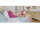 Bright bedroom features whimsical decor and cheerful accents at 3409 Southern Cottage Way, Mount Pleasant, SC 29466