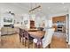 Dining room with access to the kitchen and living room, offering a modern open floor plan at 3409 Southern Cottage Way, Mount Pleasant, SC 29466