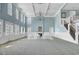 Bright event space with high ceilings, chandelier, fireplace and staircase at 3409 Southern Cottage Way, Mount Pleasant, SC 29466