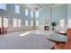 Bright event space with fireplace and tall windows at 3409 Southern Cottage Way, Mount Pleasant, SC 29466