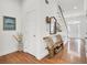 Bright foyer with hardwood floors, staircase, and decor accents create a warm atmosphere at 3409 Southern Cottage Way, Mount Pleasant, SC 29466