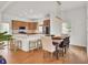 Open-concept kitchen and dining area with modern appliances and seating at 3409 Southern Cottage Way, Mount Pleasant, SC 29466
