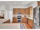 Spacious kitchen with stainless steel appliances, ample counter space, and custom cabinetry at 3409 Southern Cottage Way, Mount Pleasant, SC 29466