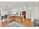 Bright kitchen with island and view of the dining and living area, perfect for entertaining at 3409 Southern Cottage Way, Mount Pleasant, SC 29466