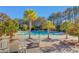 Community pool area with palm trees and seating at 3409 Southern Cottage Way, Mount Pleasant, SC 29466