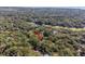 Stunning aerial view of a lush, wooded community with golf course and coastal proximity at 3475 Deer Run Rd, Seabrook Island, SC 29455