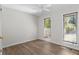 A bedroom with vinyl flooring, a ceiling fan, and two large windows at 3475 Deer Run Rd, Seabrook Island, SC 29455