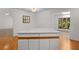 Kitchen island with countertop and storage, in an open kitchen space at 3475 Deer Run Rd, Seabrook Island, SC 29455