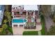 Beautiful multi-story beach house with a built-in pool and manicured lawn at 3803 Palm Blvd, Isle of Palms, SC 29451