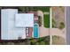 Striking overhead view of pool, lawn, and driveway at 3803 Palm Blvd, Isle of Palms, SC 29451