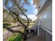 Coastal home with a well-maintained exterior, featuring a wooden deck and lush landscaping at 3803 Palm Blvd, Isle of Palms, SC 29451