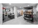 Cluttered two-tone garage featuring storage and leisure equipment at 3803 Palm Blvd, Isle of Palms, SC 29451