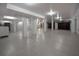 Expansive garage featuring multiple support pillars and pristine speckled flooring at 3803 Palm Blvd, Isle of Palms, SC 29451