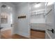 Hallway showing access to the closet with custom built-in shelving and drawers at 3803 Palm Blvd, Isle of Palms, SC 29451