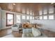 Stylish living area featuring comfortable seating, wood floors, and scenic view of the ocean at 3803 Palm Blvd, Isle of Palms, SC 29451