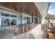 Covered patio with dining table, ceiling fan, with ocean views at 3803 Palm Blvd, Isle of Palms, SC 29451