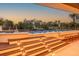 Luxury outdoor pool and spa area with integrated lighting, outdoor bar, and scenic neighborhood views at 3803 Palm Blvd, Isle of Palms, SC 29451