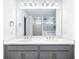 Bathroom with double vanity, large mirror and luxury fixtures and finishes at 409 Cadbury Loop, Summerville, SC 29486