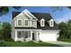 Charming two-story home with a well-manicured lawn and a two-car garage at 409 Cadbury Loop, Summerville, SC 29486
