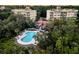 Aerial view of the condo complex with a pool, surrounding greenery, and common outdoor areas at 4247 Faber Place Dr # 5103, North Charleston, SC 29405