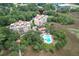 Aerial view of complex with a swimming pool, marsh views, and water access at 4247 Faber Place Dr # 5103, North Charleston, SC 29405